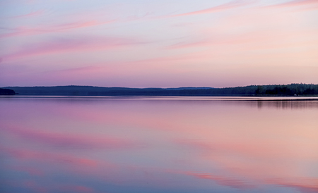 Summer sunset over the seaの写真素材