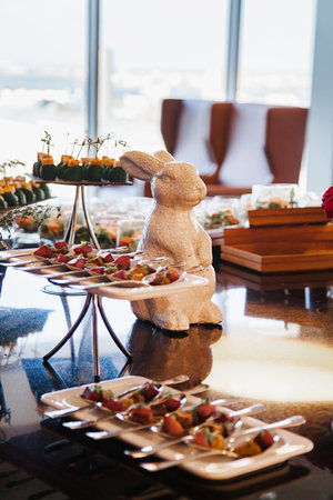 the buffet table with sweets and fruits