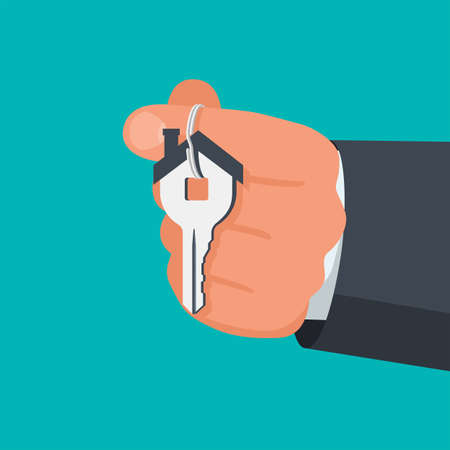 Hand holding house keys. Handing key to home. Vector graphic illustration flat design. Template for sale, rent home. Isolated on white background. Real estate agent. Property gift.のイラスト素材