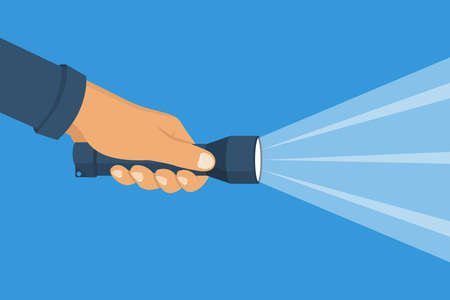 Hand holding flashlight. Search concept. Yellow bright ray of light. Vector illustration flat design. Isolated on white background. Beam light. Press a finger on the button.のイラスト素材