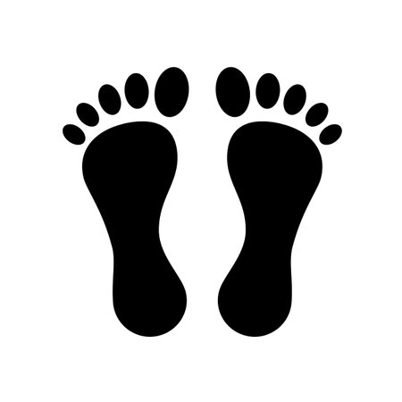 Foot black icon. Soles of feet. Silhouette foot of a man or woman. Template for podiatry. The lower part of the human body. Bare foot. Vector illustration flat design. Isolated on white background.のイラスト素材