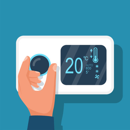 Man regulates the thermostat controller in the house. Heating thermostat.のイラスト素材