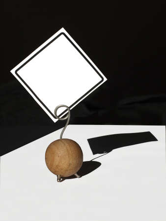 edged paper on a clip with black の写真素材
