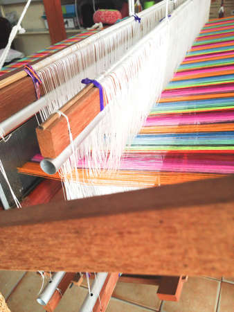 colorful stripe cord on loomの写真素材