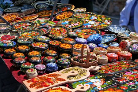 Souvenirs on a table at market in Russiaの写真素材