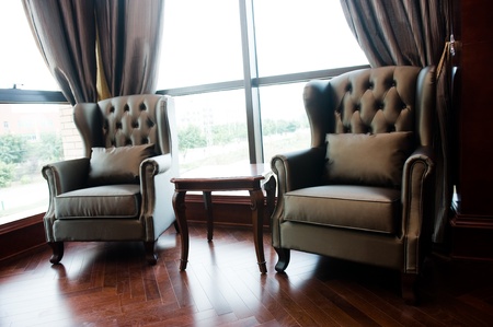 Two chairs and table in classic living room. の写真素材