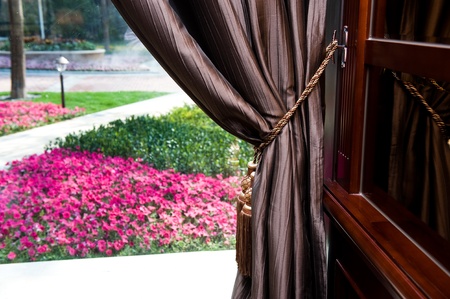 Elegant curtain and window in a garden の写真素材