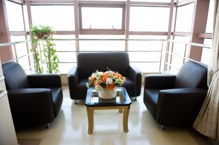 Hospital or clinic waiting room with empty chairs and table.
のeditorial素材