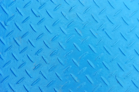 texture of stainless steel floor plate painted blue. 
の写真素材