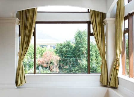 Window and curtains with  garden view .のeditorial素材