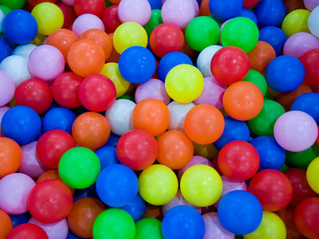 colorful plastic balls on children's playground の写真素材