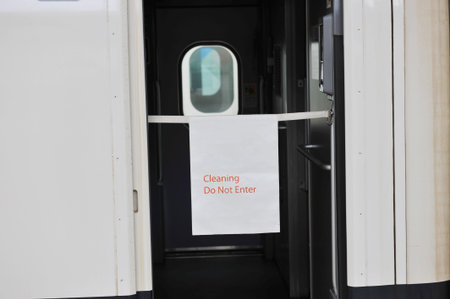 train carriage with doors open for cleaning.  の写真素材