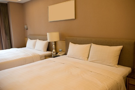 Luxury hotel rooms with two beds. の写真素材