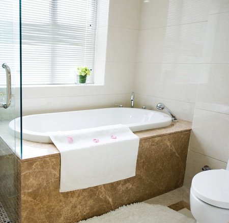 Bathtub in a luxurious hotel room.の写真素材