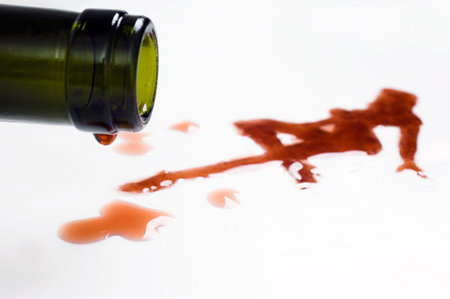 wine flows from goblet and turn into a sexy woman patternの写真素材