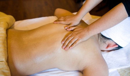 A woman receiving a massageの写真素材