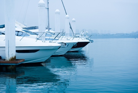 Boats moored at Marina on a summers day.の写真素材
