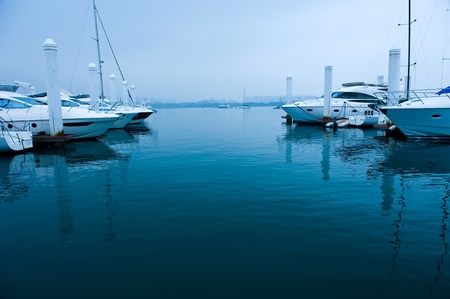 Boats moored at Marina on a summers day.の写真素材