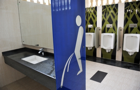 Urinals in modern office building, with Wc icon.のeditorial素材