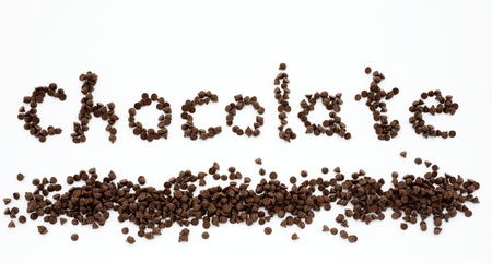 word chocolate formed by a pile of chocolate chips, and surrounded by chocolate drops on a white background. 
の写真素材