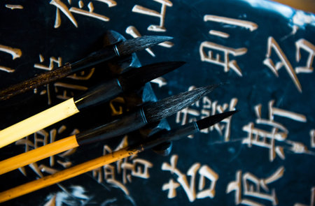 Chinese calligraphy and four chinese calligraphic brushes.のeditorial素材