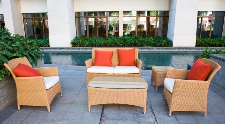 House patio with tables, chairs and pool.のeditorial素材