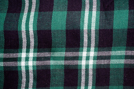 cloth background with green black and white stripes
