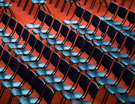 top view of many blue chairs in an audience/ auditorium.
の写真素材