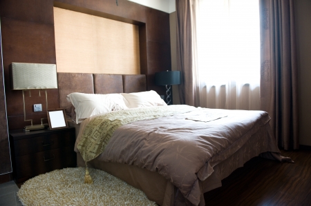 modern double bedroom with hard wood furniture. 
のeditorial素材