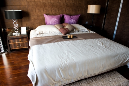 modern double bedroom with hard wood furniture. 
のeditorial素材