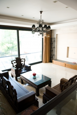 Living room furnished with antique Chinese rosewood furniture. 
のeditorial素材