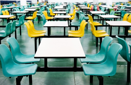 Plastic chairs and tables at fast food restaurant 
の写真素材