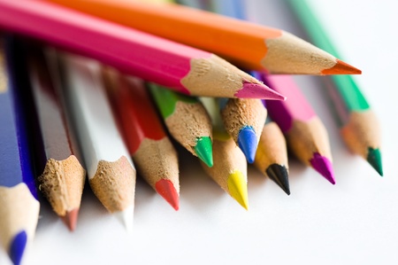 Close up of color pencils with different color over white background の写真素材