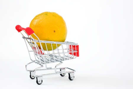 orange in shopping basket isolated. の写真素材