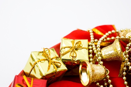 Christmas presents with colorful packages and christmas bells on a plate.
 の写真素材