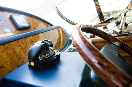 Compass and rudder on a yacht.