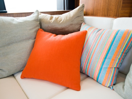 Comfortable corner in family room, with multi-colored pillows.の写真素材