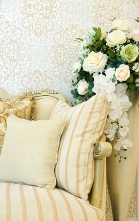 Modern sofa with three cushions in front of beautiful wallpaper.
の写真素材