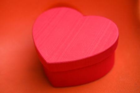 Heart shaped gift box against background. の写真素材