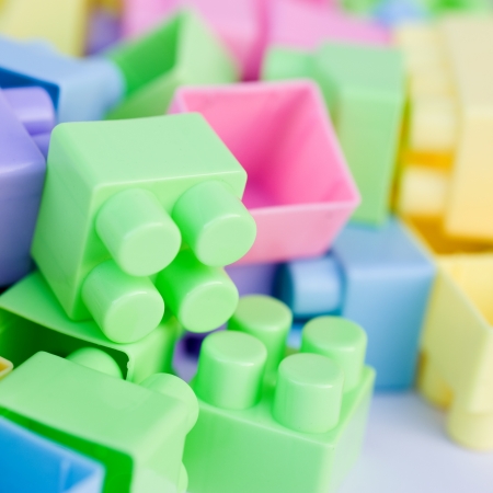 Close up of colorful plastic toy bricks.の写真素材