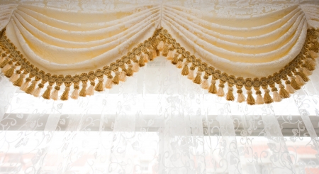 a golden satin decoration background, curtain detail. の写真素材