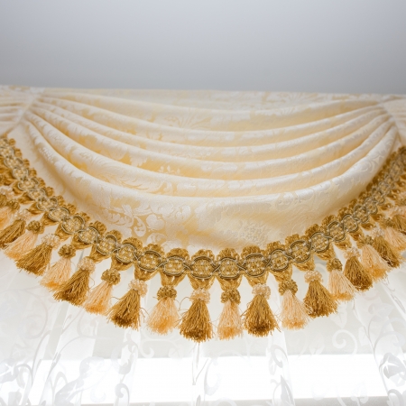 a golden satin decoration background, curtain detail. の写真素材