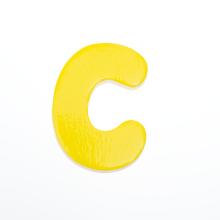 wooden toy letter C isolated on white background.の写真素材