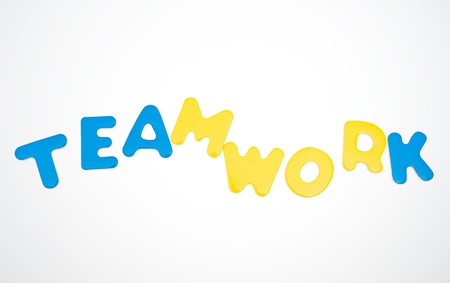 Wooden letters spelling the word  TEAWORK  on white background. の写真素材