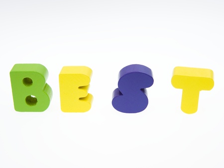 Wooden letters spelling the word  "best"  on white background. の写真素材