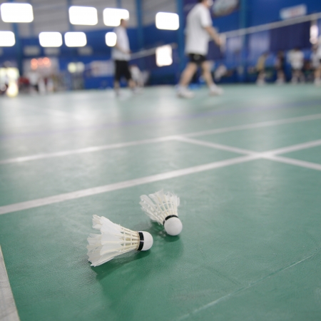 badminton - badminton courts with players competing. の写真素材