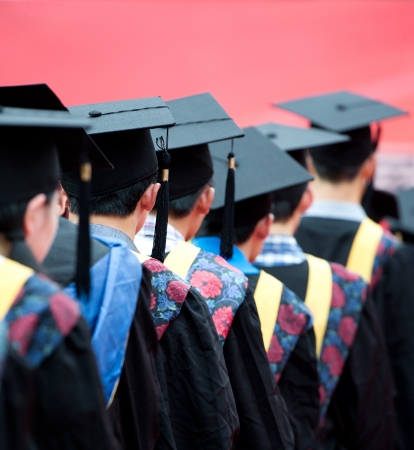 back of graduates during commencement. の写真素材