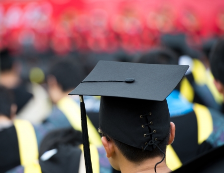 back of graduates during commencement. の写真素材