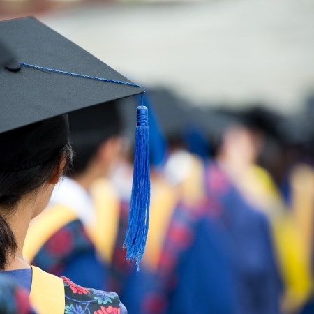 back of graduates during commencement. の写真素材