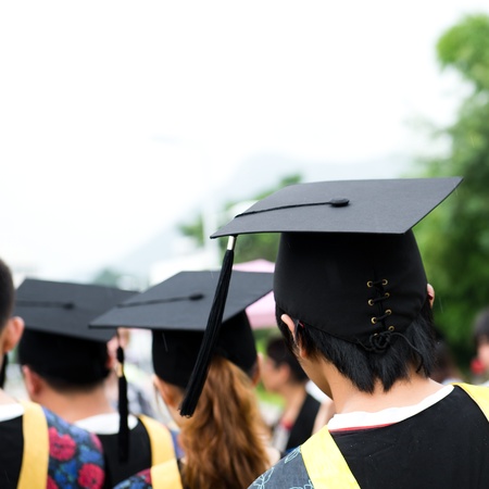 back of graduates during commencement. の写真素材